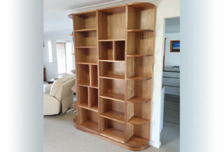 solid tasmanian blackwood curved end bookcase